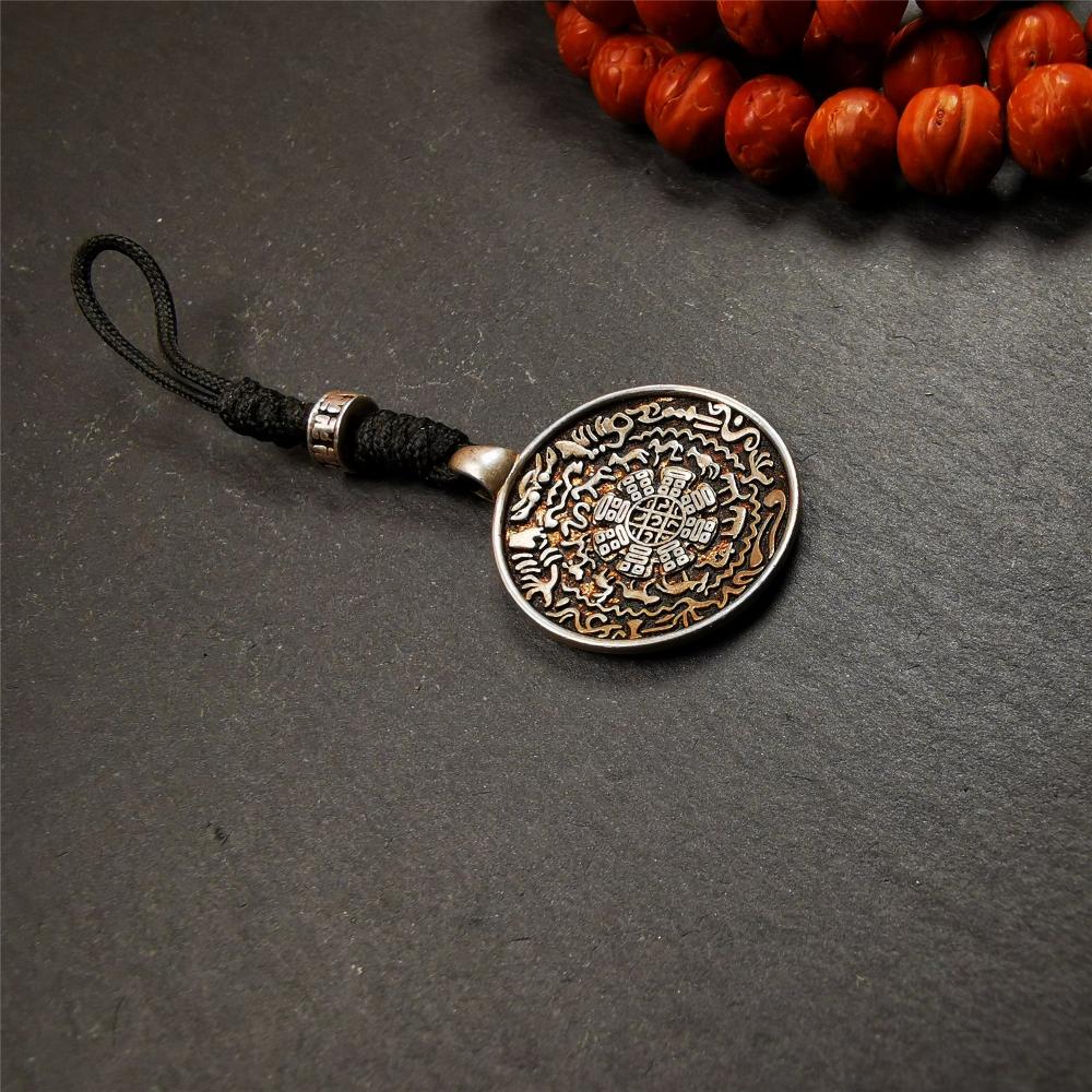 This type of melong badge was made by Tibetan craftsmen and come from Hepo Town, Baiyu County, the birthplace of the famous Tibetan handicrafts. It is made of Sterling silver,small size 0.83 inch,the front is Tibetan Budhist amulet symbol - Melong.