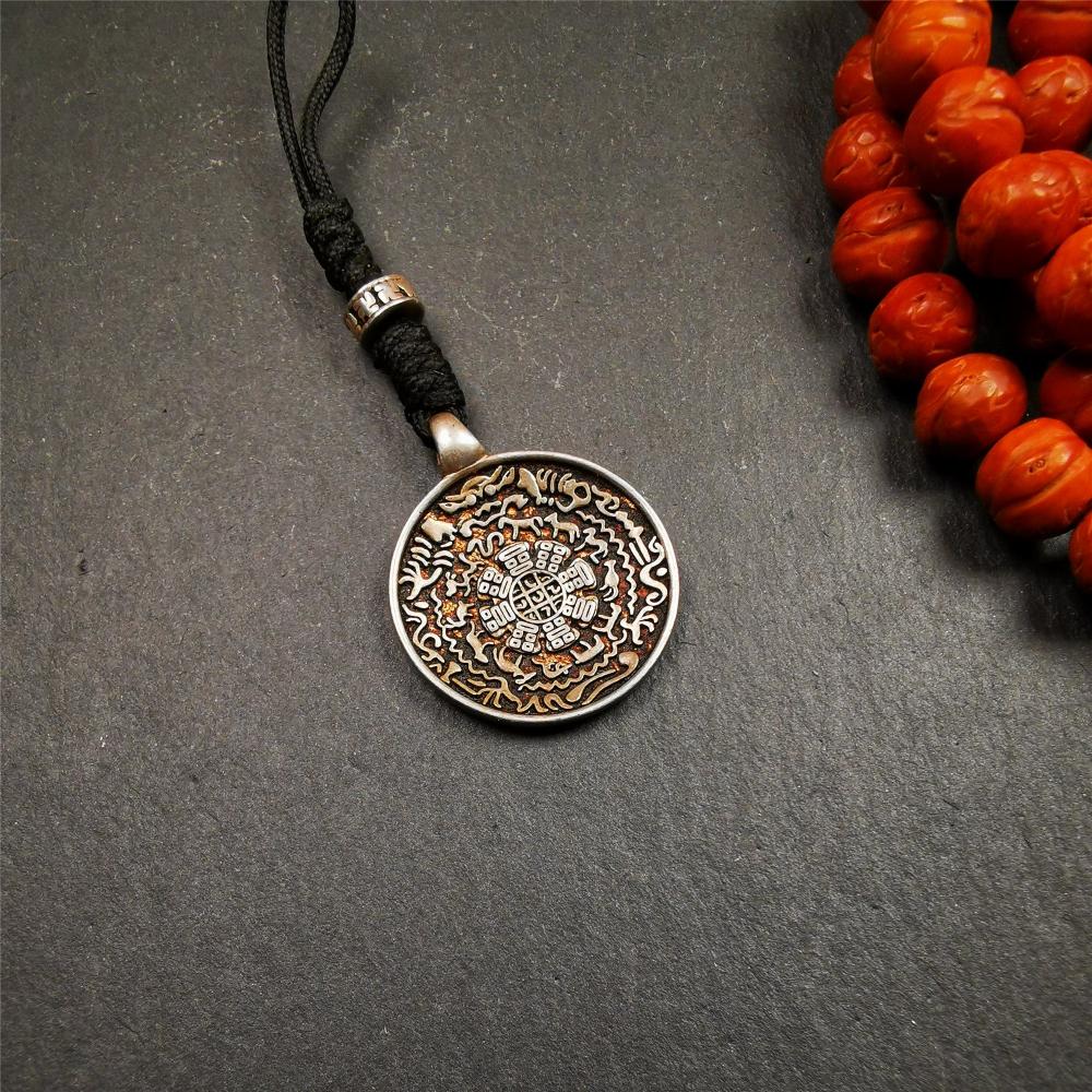 This type of melong badge was made by Tibetan craftsmen and come from Hepo Town, Baiyu County, the birthplace of the famous Tibetan handicrafts. It is made of Sterling silver,small size 0.83 inch,the front is Tibetan Budhist amulet symbol - Melong.