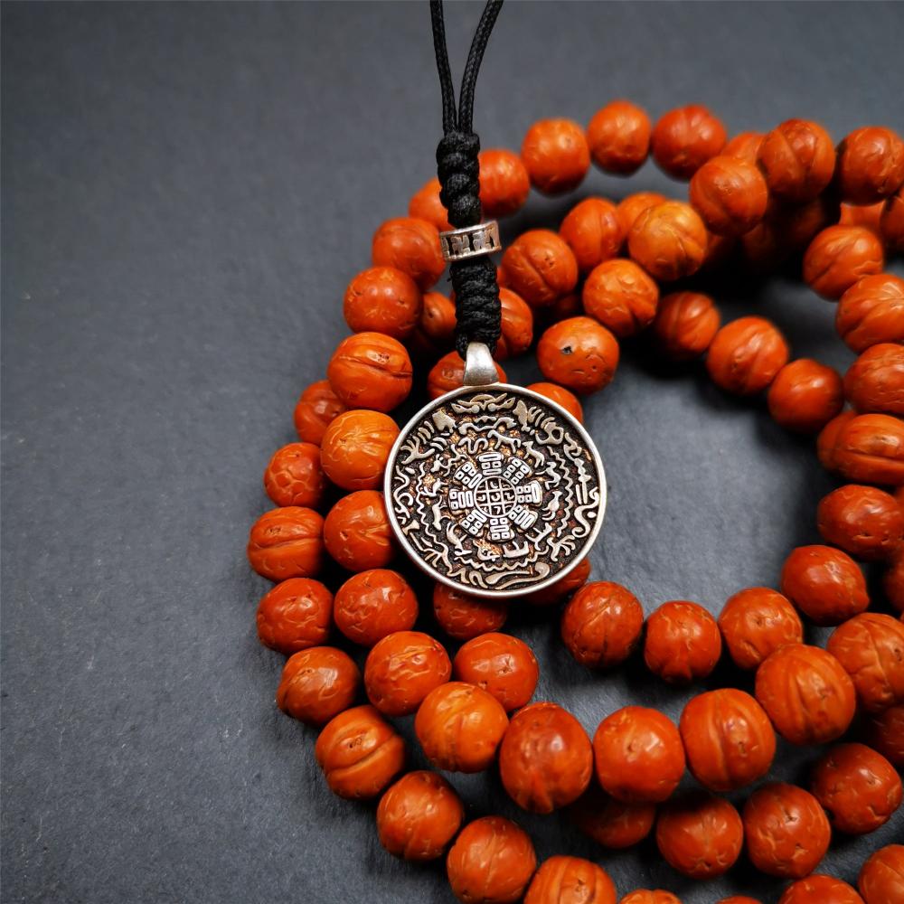 This type of melong badge was made by Tibetan craftsmen and come from Hepo Town, Baiyu County, the birthplace of the famous Tibetan handicrafts. It is made of Sterling silver,small size 0.83 inch,the front is Tibetan Budhist amulet symbol - Melong.