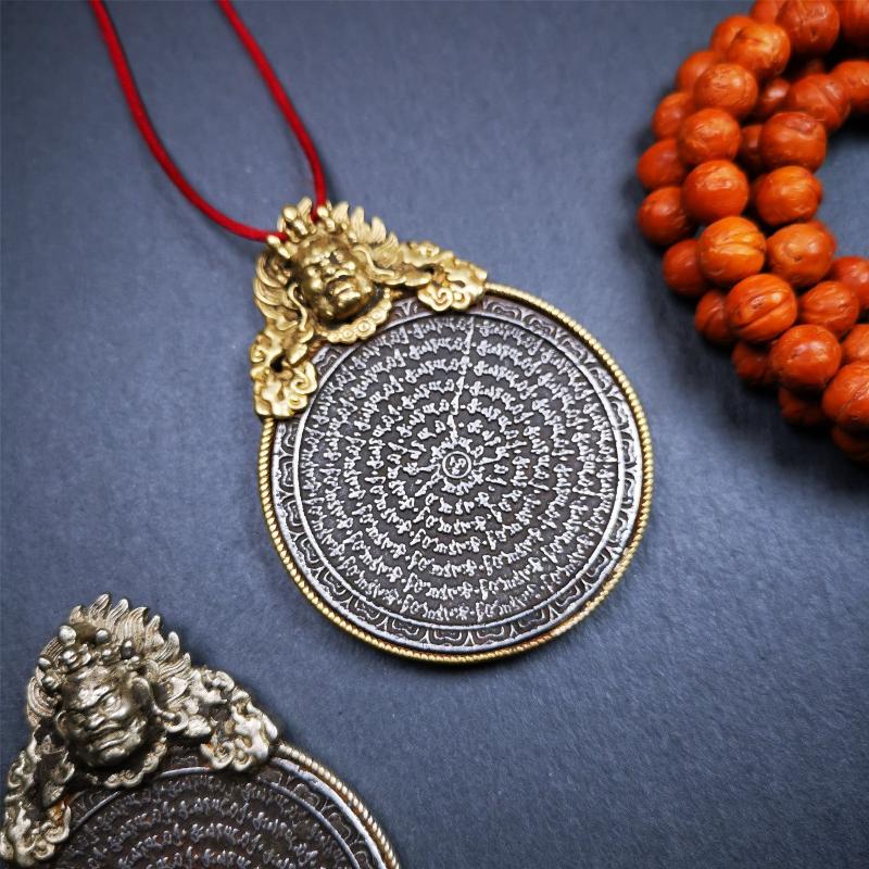 This type of tibetan mantra badge amulet was made by Tibetan craftsmen and come from Hepo Town, Baiyu County, Tibet.It is made of cold iron,grey color,carved mantra of Om Mani Padme Hum It adopts a split casting method, the shell is Mahakala.