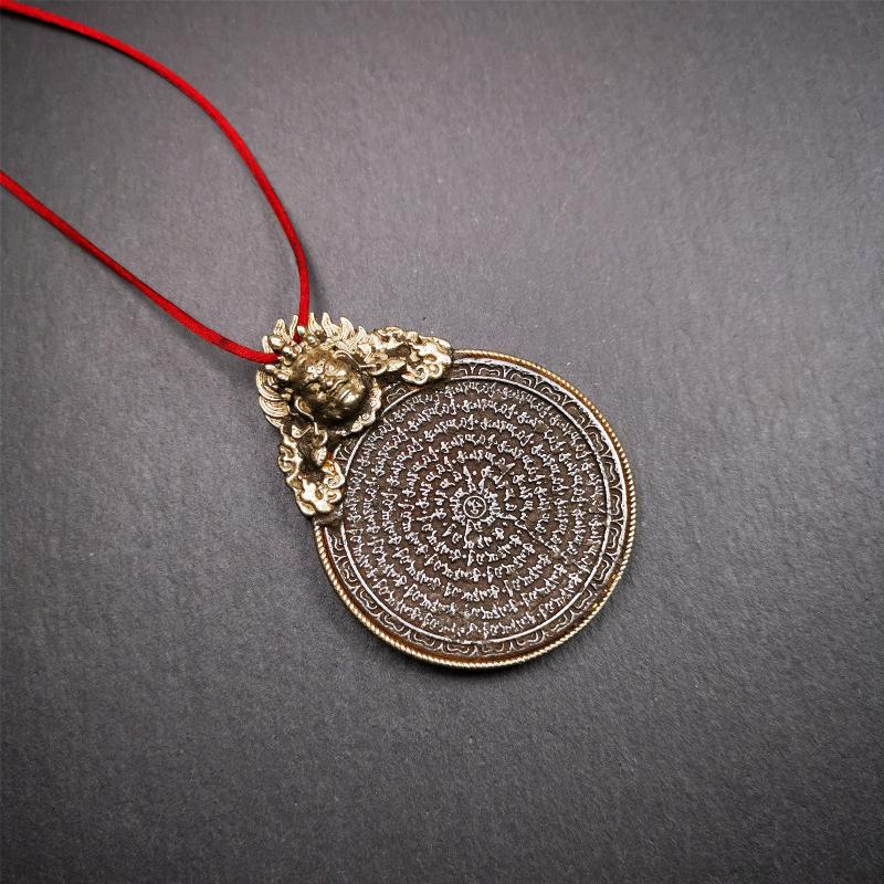 This type of tibetan mantra badge amulet was made by Tibetan craftsmen and come from Hepo Town, Baiyu County, Tibet.It is made of cold iron,grey color,carved mantra of Om Mani Padme Hum It adopts a split casting method, the shell is Mahakala.