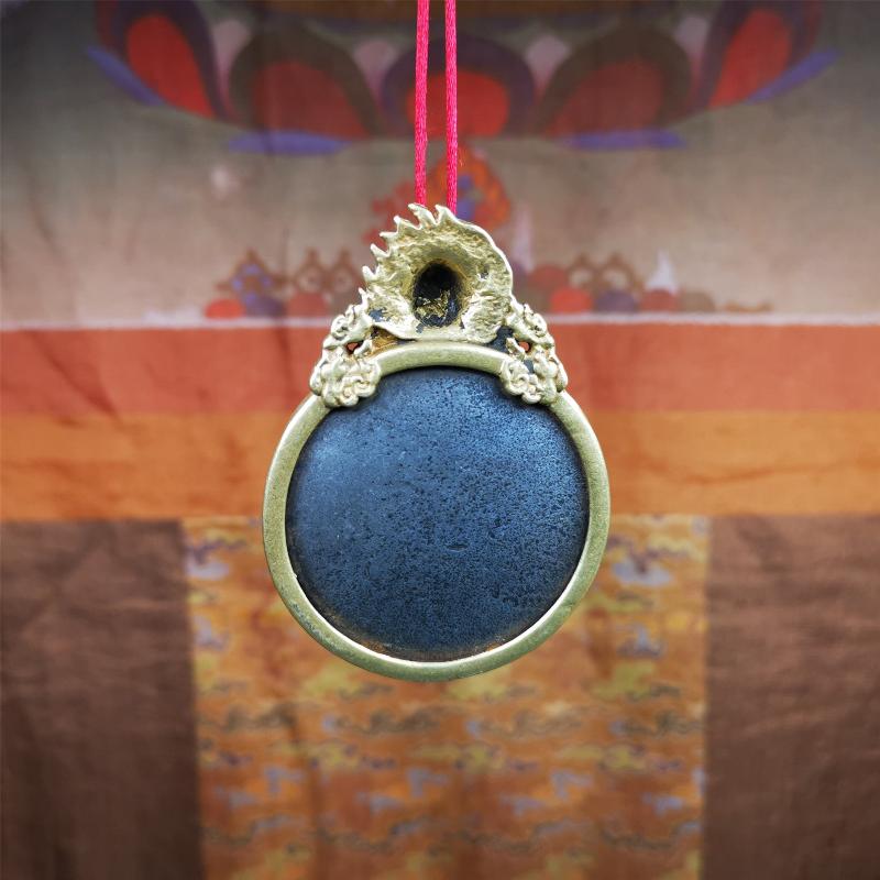 This type of tibetan mantra badge amulet was made by Tibetan craftsmen and come from Hepo Town, Baiyu County, Tibet.It is made of cold iron,grey color,carved mantra of Om Mani Padme Hum It adopts a split casting method, the shell is Mahakala.