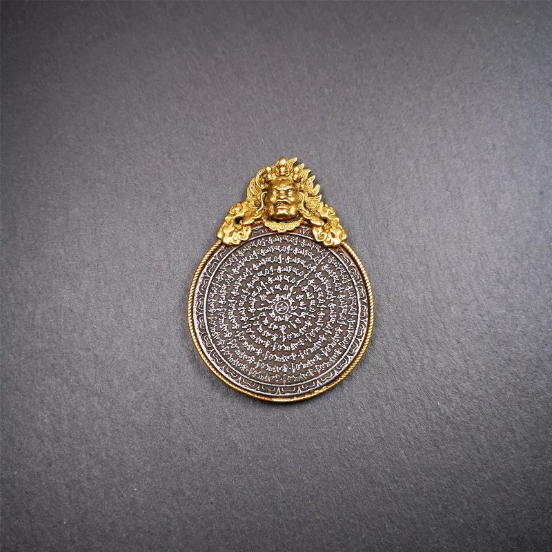 This type of tibetan mantra badge amulet was made by Tibetan craftsmen and come from Hepo Town, Baiyu County, Tibet.It is made of cold iron,grey color,carved mantra of Om Mani Padme Hum It adopts a split casting method, the shell is Mahakala.