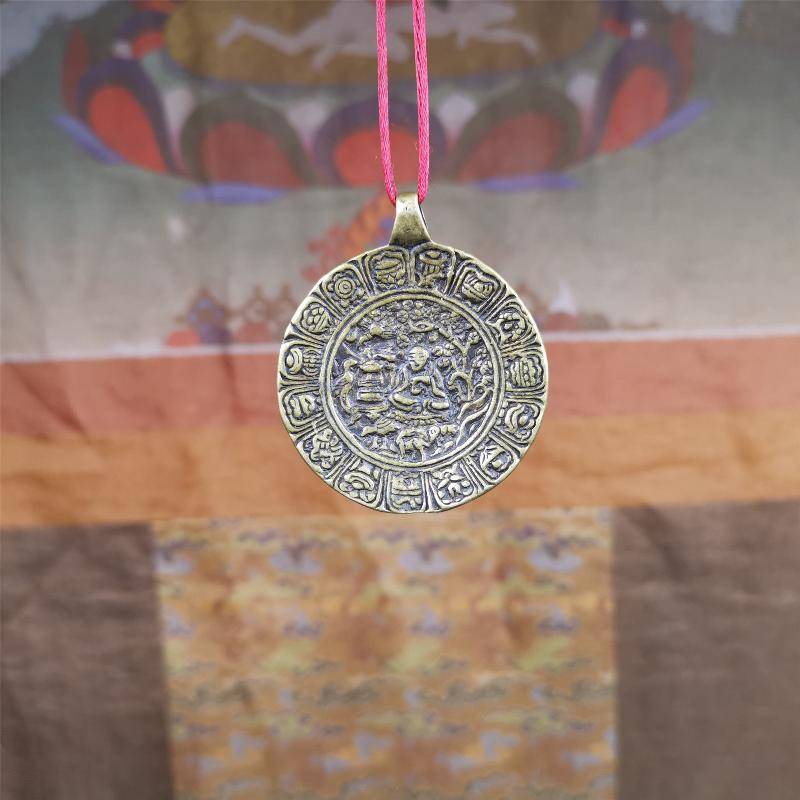 This Longevity Badge was handmade by Tibetan craftsmen and come from Hepo Town, Baiyu County, Tibet. It is made of brass,round shape,the theme is the god of longevity,surrounded by the symbols of Ashtamangala.