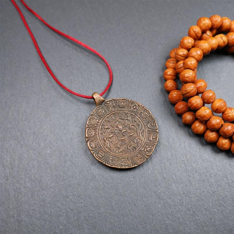 This old Longevity Badge was collected from Ganzi County Tibet about 100 years. It is made of copper,the theme is Shou-lao(the god of longevity) surrounded by the symbols of Ashtamangala. He is the ancient Chinese God of Longevity, represent Amitayus