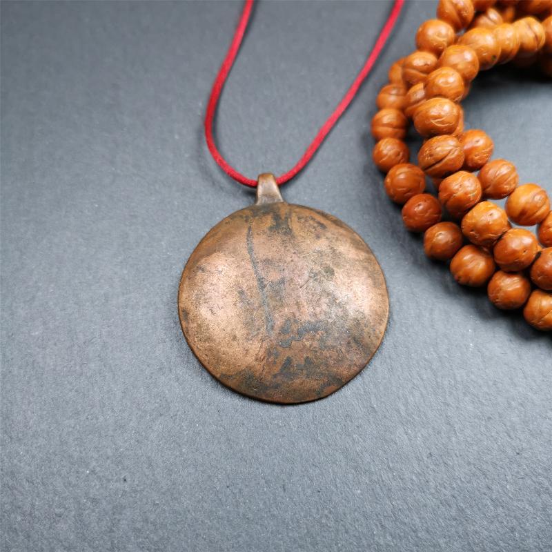 This old Longevity Badge was collected from Ganzi County Tibet about 100 years. It is made of copper,the theme is Shou-lao(the god of longevity) surrounded by the symbols of Ashtamangala. He is the ancient Chinese God of Longevity, represent Amitayus
