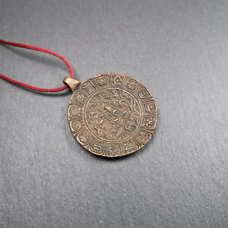 This old Longevity Badge was collected from Ganzi County Tibet about 100 years. It is made of copper,the theme is Shou-lao(the god of longevity) surrounded by the symbols of Ashtamangala. He is the ancient Chinese God of Longevity, represent Amitayus