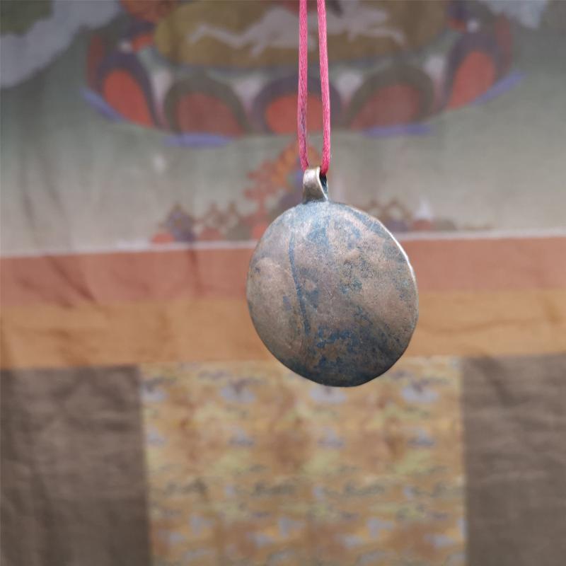 This old Longevity Badge was collected from Ganzi County Tibet about 100 years. It is made of copper,the theme is Shou-lao(the god of longevity) surrounded by the symbols of Ashtamangala. He is the ancient Chinese God of Longevity, represent Amitayus
