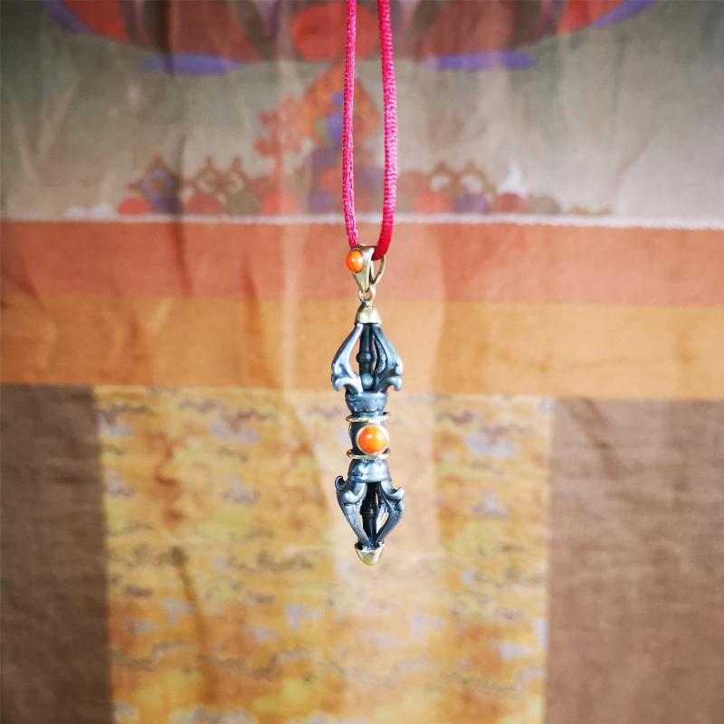 This unique vajra pendant was handmade by Tibetan craftsmen from Tibet in 1990's,from Hepo Town, Baiyu County, the birthplace of the famous Tibetan handicrafts. It is five-pronged Vajra,made of cold iron, 1.77 inch height.Comes with leather cord. You can make it a necklace, pendant, keychain, mala pendant, or just as an ornament on your desk.