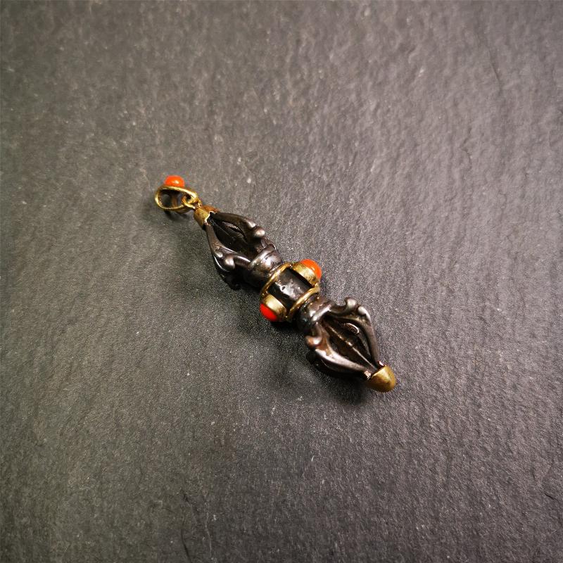 This unique vajra pendant was handmade by Tibetan craftsmen from Tibet in 1990's,from Hepo Town, Baiyu County, the birthplace of the famous Tibetan handicrafts. It is five-pronged Vajra,made of cold iron, 1.77 inch height.Comes with leather cord. You can make it a necklace, pendant, keychain, mala pendant, or just as an ornament on your desk.