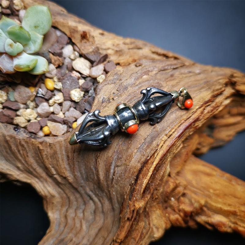 This unique vajra pendant was handmade by Tibetan craftsmen from Tibet in 1990's,from Hepo Town, Baiyu County, the birthplace of the famous Tibetan handicrafts. It is five-pronged Vajra,made of cold iron, 1.77 inch height.Comes with leather cord. You can make it a necklace, pendant, keychain, mala pendant, or just as an ornament on your desk.
