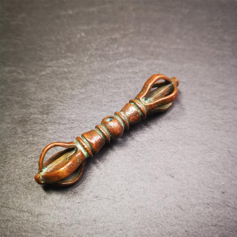 This unique vajra pendant was handmade by Tibetan craftsmen from Tibet in 1990s,from Hepo Town, Baiyu County, the birthplace of the famous Tibetan handicrafts. It is five-pronged Vajra,made of copper, brown color,2.76 inches length.