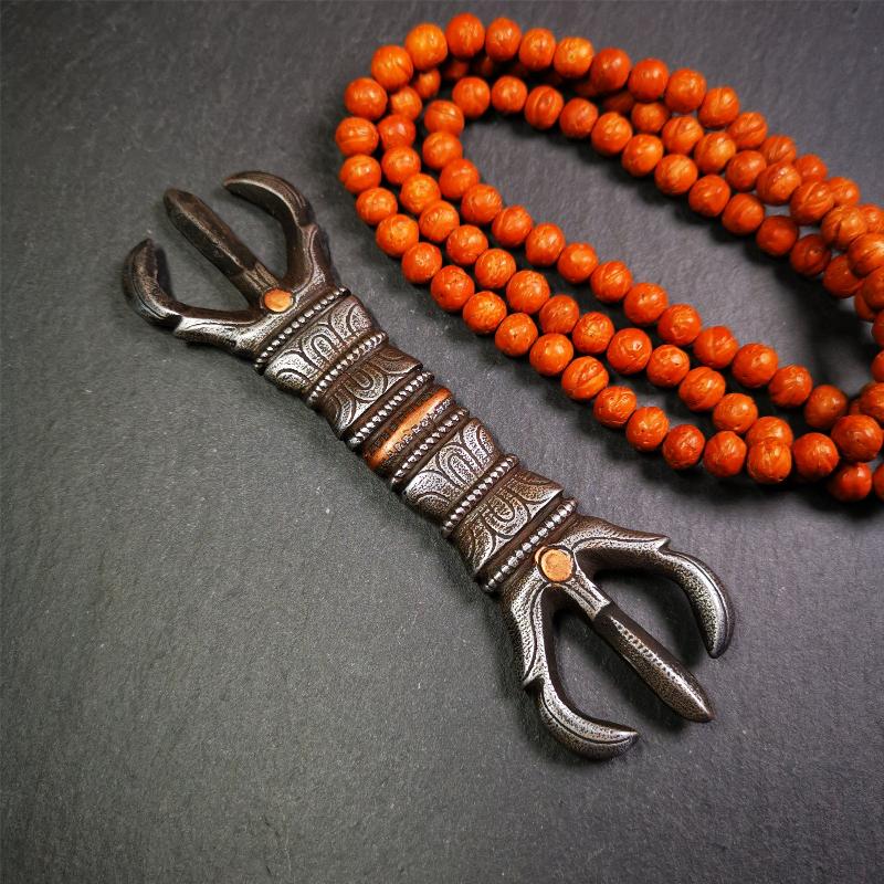 This unique vajra pendant was handmade by Tibetan craftsmen from Tibet in 1990s,from Hepo Town, Baiyu County, the birthplace of the famous Tibetan handicrafts. It is unique flat three - pronged Vajra,made of cold iron, black color,6.3 inches length.