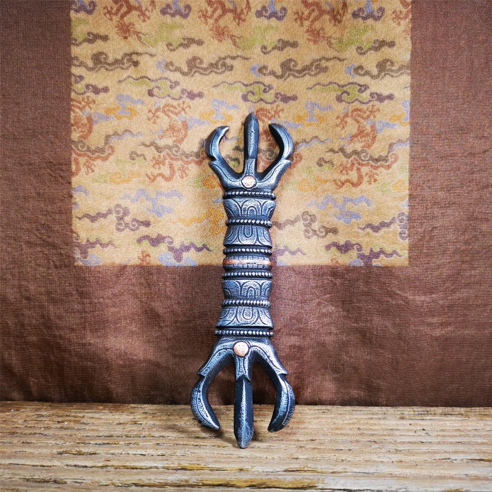 This unique vajra pendant was handmade by Tibetan craftsmen from Tibet in 1990s,from Hepo Town, Baiyu County, the birthplace of the famous Tibetan handicrafts. It is unique flat three - pronged Vajra,made of cold iron, black color,6.3 inches length.