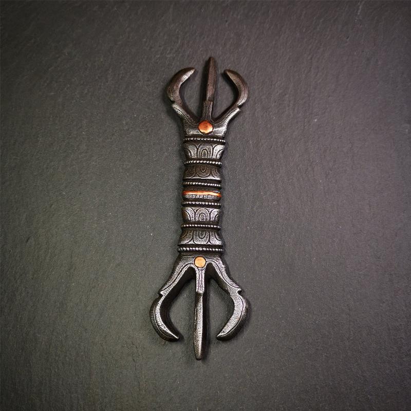 This unique vajra pendant was handmade by Tibetan craftsmen from Tibet in 1990s,from Hepo Town, Baiyu County, the birthplace of the famous Tibetan handicrafts. It is unique flat three - pronged Vajra,made of cold iron, black color,6.3 inches length.