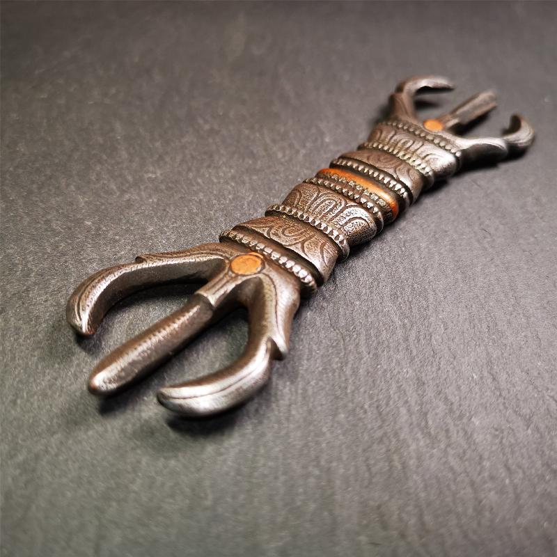 This unique vajra pendant was handmade by Tibetan craftsmen from Tibet in 1990s,from Hepo Town, Baiyu County, the birthplace of the famous Tibetan handicrafts. It is unique flat three - pronged Vajra,made of cold iron, black color,6.3 inches length.