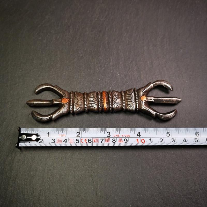 This unique vajra pendant was handmade by Tibetan craftsmen from Tibet in 1990s,from Hepo Town, Baiyu County, the birthplace of the famous Tibetan handicrafts. It is unique flat three - pronged Vajra,made of cold iron, black color,6.3 inches length.