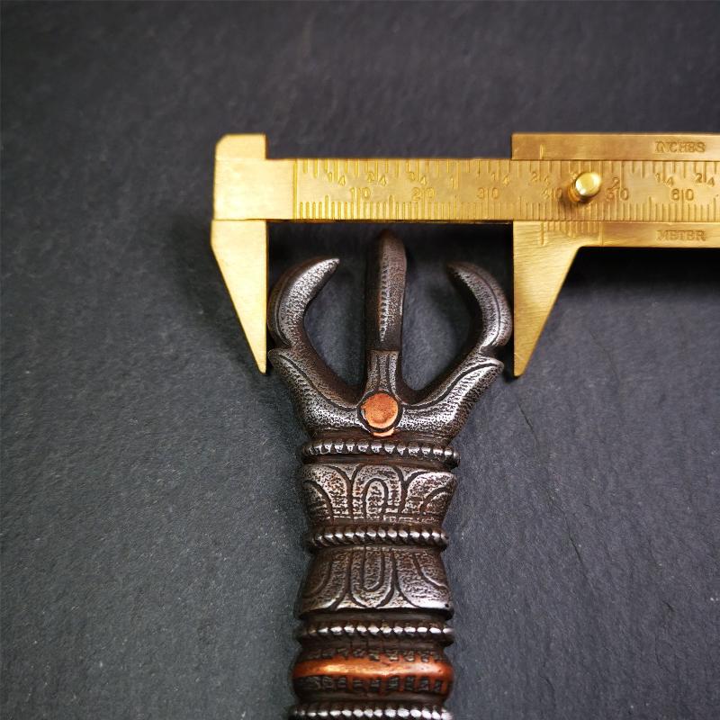 This unique vajra pendant was handmade by Tibetan craftsmen from Tibet in 1990s,from Hepo Town, Baiyu County, the birthplace of the famous Tibetan handicrafts. It is unique flat three - pronged Vajra,made of cold iron, black color,6.3 inches length.