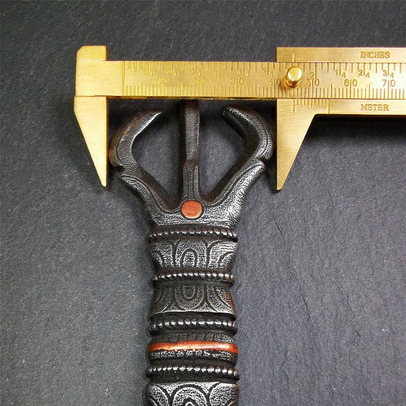This unique vajra pendant was handmade by Tibetan craftsmen from Tibet in 1990s,from Hepo Town, Baiyu County, the birthplace of the famous Tibetan handicrafts. It is unique flat three - pronged Vajra,made of cold iron, black color,6.3 inches length.