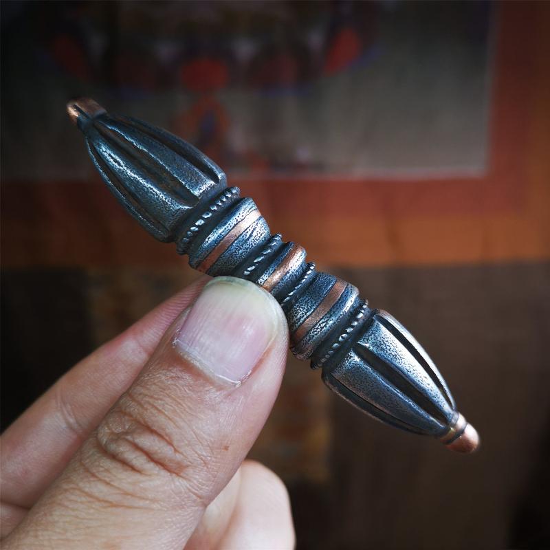 These beautiful vajra dorje were handmade by Tibetan craftsmen from Tibet in 1990's,from Hepo Town, Baiyu County, the birthplace of the famous Tibetan handicrafts. It is seven-pronged vajra,made of cold iron,inlaid copper wire,black color.