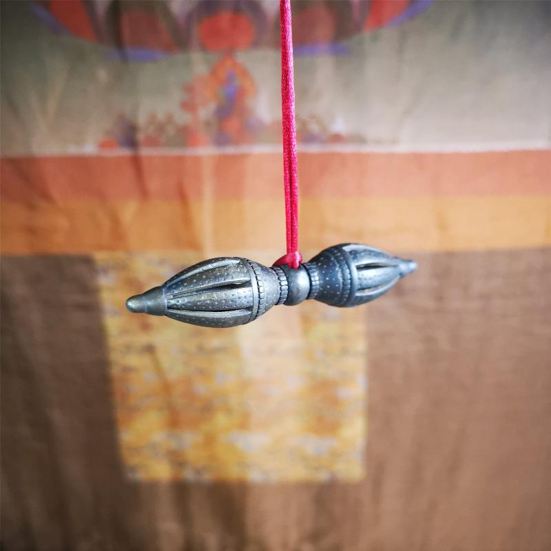 These beautiful vajra were handmade by Tibetan craftsmen from Tibet in 1990's,from Hepo Town, Baiyu County, the birthplace of the famous Tibetan handicrafts. It is nine-pronged vajra,made of cold iron,3.07 inches length. You can make it a necklace, pendant, keychain, mala pendant, or put in your shrine.