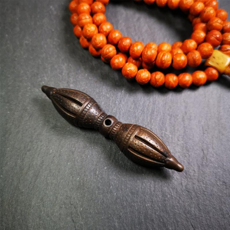 These beautiful vajra were handmade by Tibetan craftsmen from Tibet in 1990's,from Hepo Town, Baiyu County, the birthplace of the famous Tibetan handicrafts. It is nine-pronged vajra,made of cold iron,3.07 inches length. You can make it a necklace, pendant, keychain, mala pendant, or put in your shrine.
