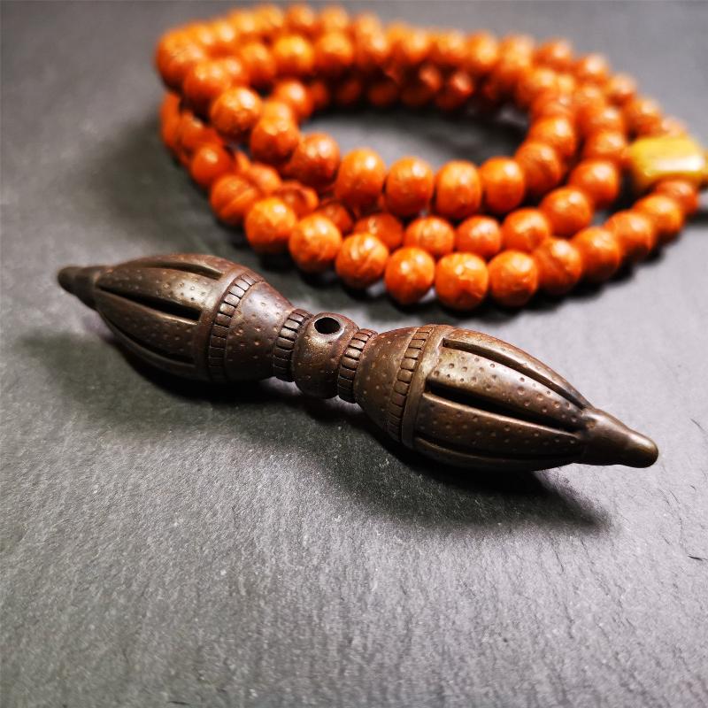 These beautiful vajra were handmade by Tibetan craftsmen from Tibet in 1990's,from Hepo Town, Baiyu County, the birthplace of the famous Tibetan handicrafts. It is nine-pronged vajra,made of cold iron,3.07 inches length. You can make it a necklace, pendant, keychain, mala pendant, or put in your shrine.