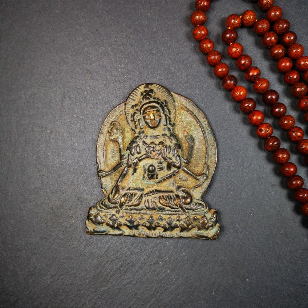 This Usnisa Vijaya statue was collected from gerze, Tibet. It is made of bronze,size is 3.0 × 2.56 inches,about 40 years old.