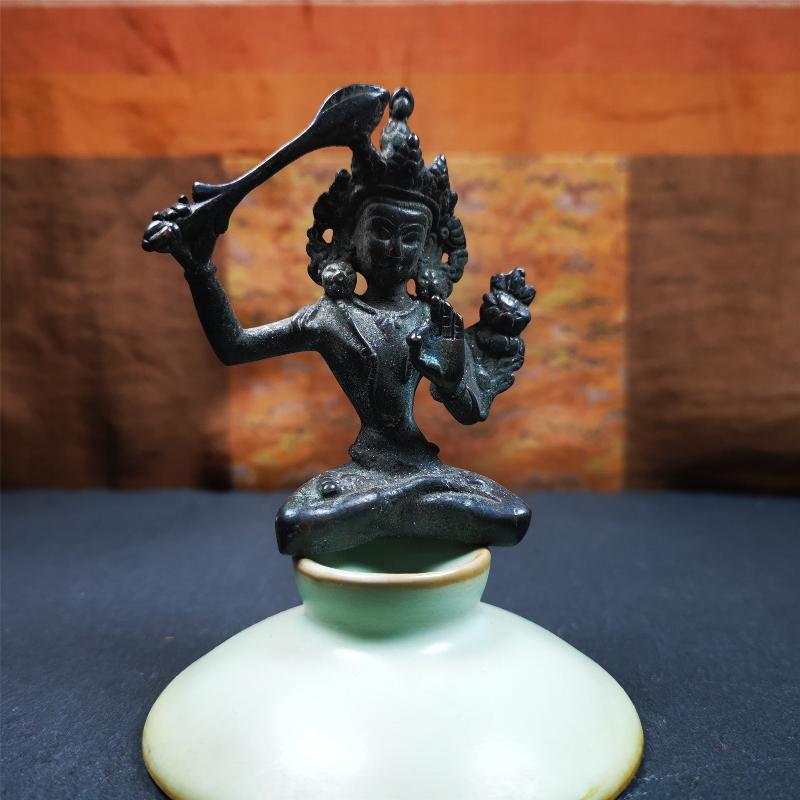 This Manjusri statue was collected from Samye Monastray, the first monastery in Tibet,and important Nyingma monsatery. It's an old-fashioned manjusri statue,about 60 years old,made of thokcha. Manjusri is a bodhisattva associated with prajna (insight) in Mahayana Buddhism. In Tibetan Buddhism, he is also a yidam. His name means "Gentle Glory" in Sanskrit.