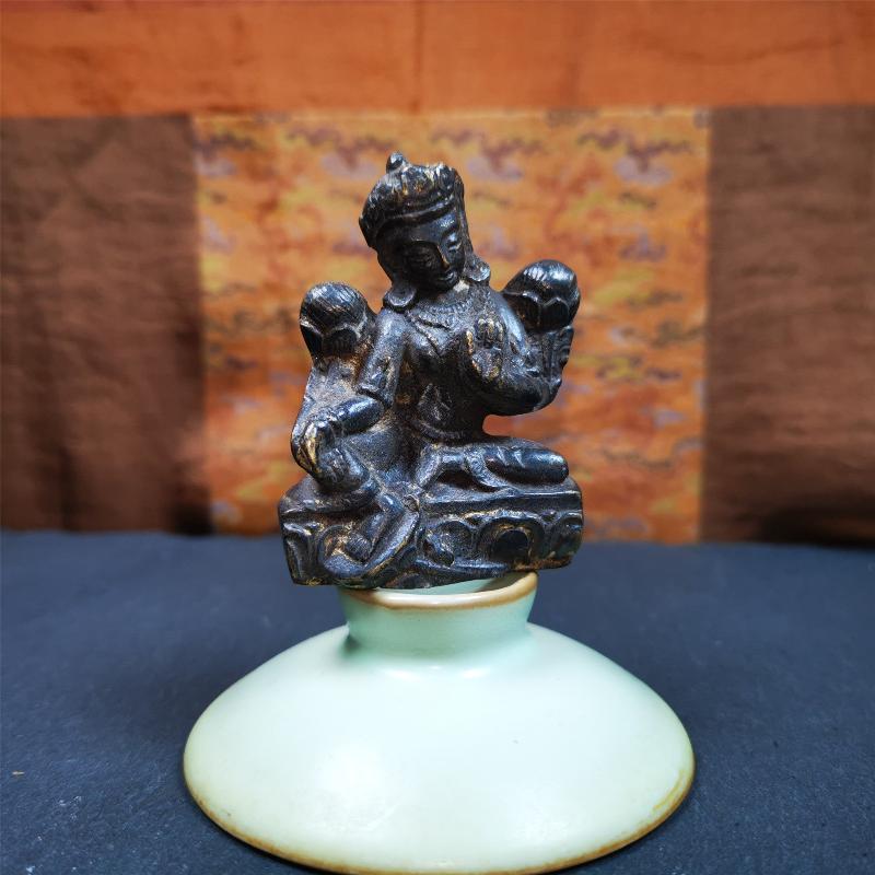 This is collect from Samyé Monastray, the first monastery in Tibet,and important Nyingma monsatery,about 60 years old. It's an old-fashioned green tara statue and painted with mineral pigments. Green Tara is associated with enlightened activity and active compassion, and is the manifestation from which all her other forms emanate.