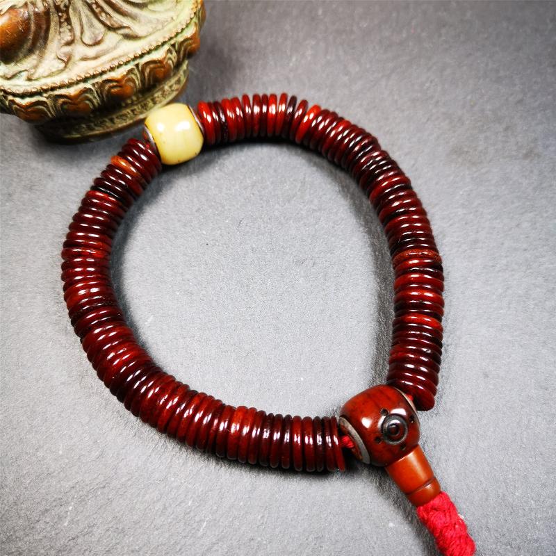 This bone carved mala beads is made by Tibetan craftsmen and come from Hepo Town, Baiyu County. It has 108 flat shape beads,1 spacer bead,and 1 guru bead,all hand carved with tibetan yak bone.