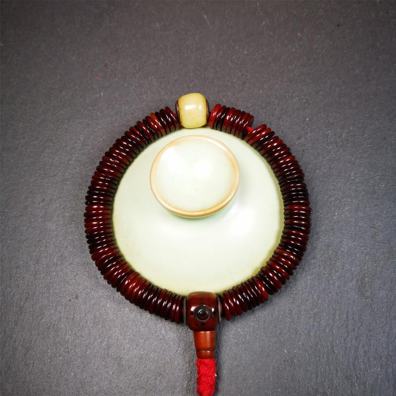 This bone carved mala beads is made by Tibetan craftsmen and come from Hepo Town, Baiyu County. It has 108 flat shape beads,1 spacer bead,and 1 guru bead,all hand carved with tibetan yak bone.