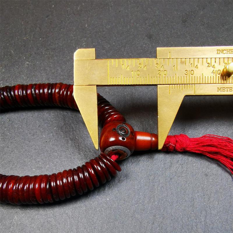 This bone carved mala beads is made by Tibetan craftsmen and come from Hepo Town, Baiyu County. It has 108 flat shape beads,1 spacer bead,and 1 guru bead,all hand carved with tibetan yak bone.