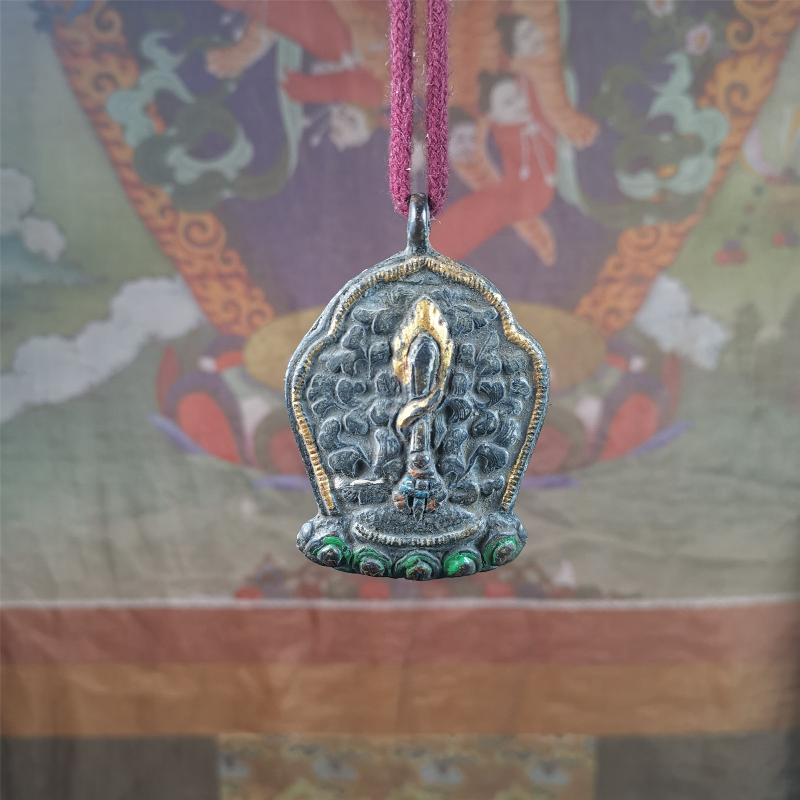 This Fire Sword amulet was collceted from gerze monastery, Tibet,about 30 years old. It's made of copper, a sword hangs on a lotus seat, surrounded by flames,painted mineral pigments. You can carry it as a necklace,or pendant,or put into your shrine.