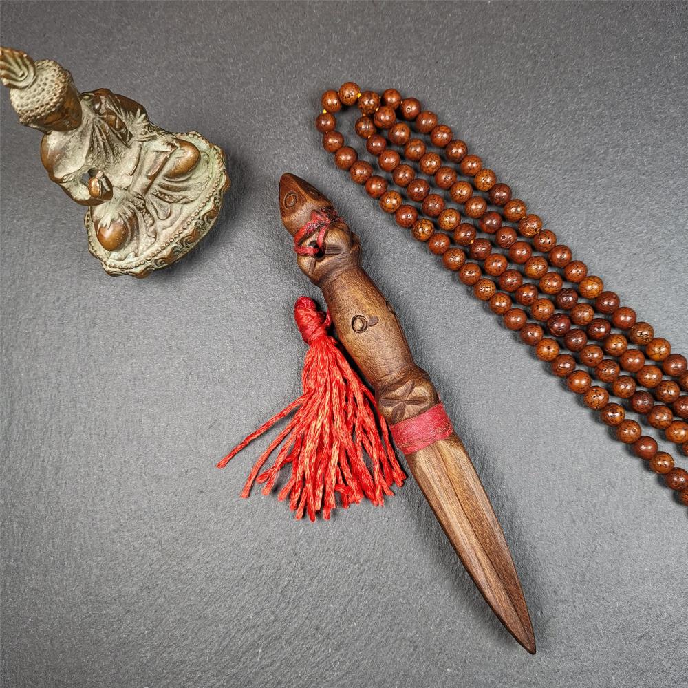 This handmade Dorje Phurba was collected from Derge, Tibet,used in Mahakala buddhist pujas in Gengqing monastery, made of sandalwood, very delicate. You can put it in your Buddhist hall or altar as a ritual decoration