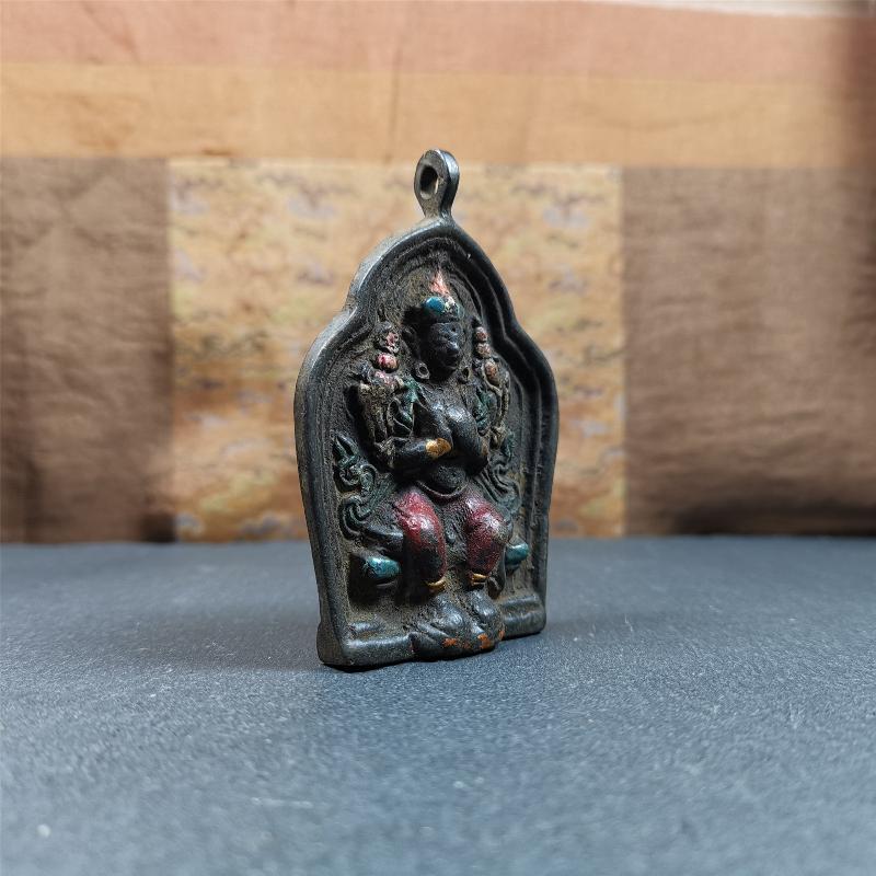 This maitreya statue was collected from Labrang Monastery,Qinghai,about 80 years old. It is an amulet of maitreya,made of copper,painted with mineral pigments,size is 2.95 by 1.97 inches,about 80 years old.