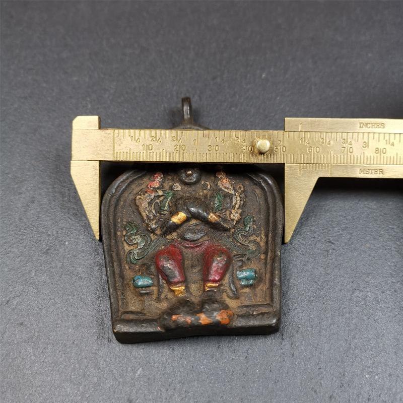 This maitreya statue was collected from Labrang Monastery,Qinghai,about 80 years old. It is an amulet of maitreya,made of copper,painted with mineral pigments,size is 2.95 by 1.97 inches,about 80 years old.