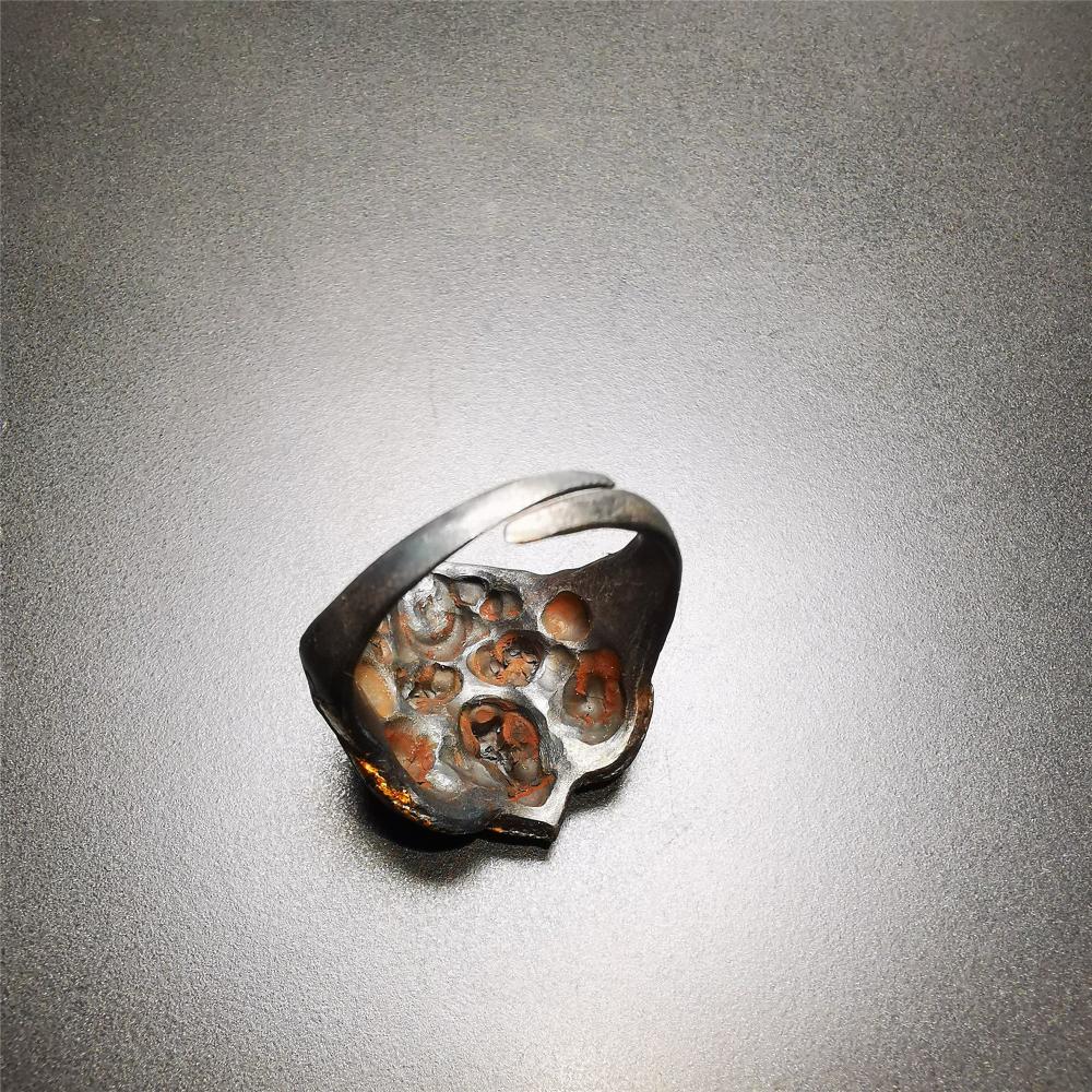 This garuda ring is made by Tibetan craftsmen for 30 years old,and come from Hepo Town, Baiyu County, the birthplace of the famous Tibetan handicrafts. It is crafted from a variety of materials including solid gold, sterling silver, cold iron, brass and agate,using traditional Tibetan craftsmanship to carry out multiple carvings and gold filled craftsmanship, inlaid with gold, silver, copper on the base of cold iron, together to create a classic image in Buddhism-Garuda-golden winged bird.
