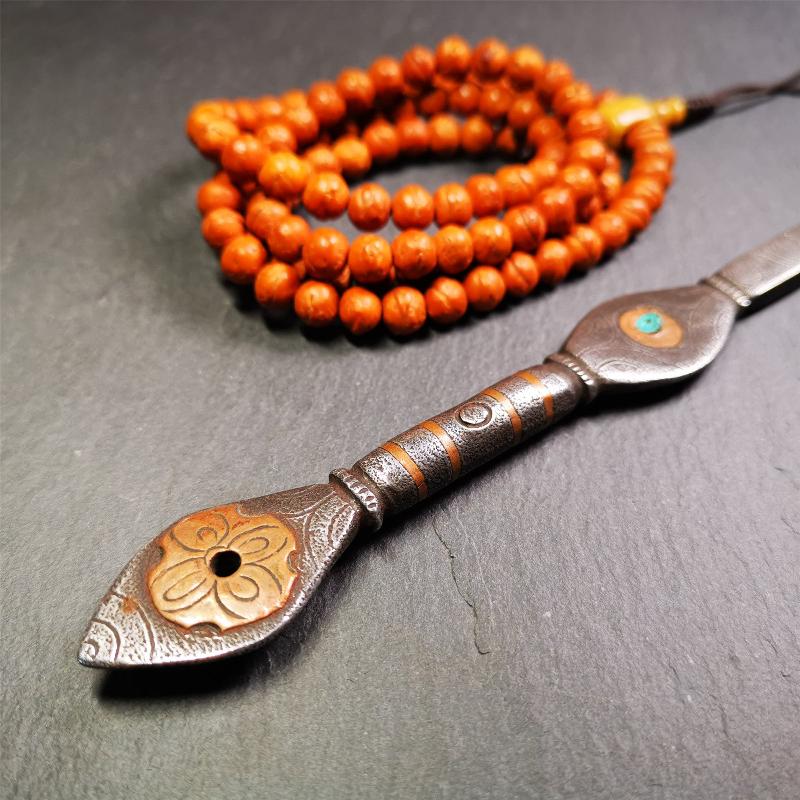 This spoon is handmade by Tibetan craftsmen from Tibet. It is entirely hand-carved with cold iron and copper,lenght about 7.5 inches. You can see teh intricate engraved detail along the handle, neck and bowl,very beautiful.