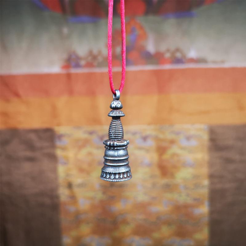 This beautiful stupa pendant is hand carved by Tibetan craftsmen from Tibet in 2000's. From Hepo Town, Baiyu County, the birthplace of the famous Tibetan handicrafts. It was made of cold iron,black color,1.38 inches height, a cross vajra seal at the bottom. You can make it into a pendant, or a keychain, or put it in your shrine.