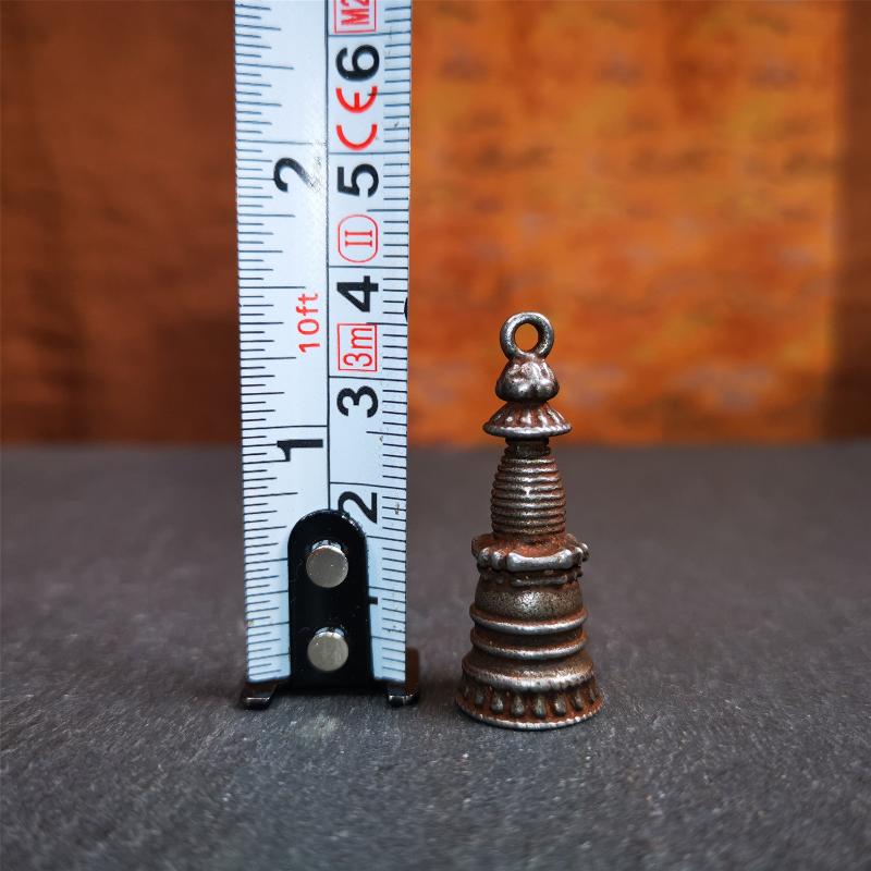 This beautiful stupa pendant is hand carved by Tibetan craftsmen from Tibet in 2000's. From Hepo Town, Baiyu County, the birthplace of the famous Tibetan handicrafts. It was made of cold iron,black color,1.38 inches height, a cross vajra seal at the bottom. You can make it into a pendant, or a keychain, or put it in your shrine.