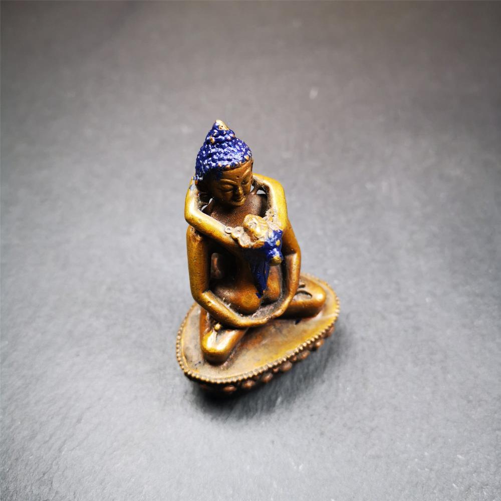This Samantabhadra Yab Yum statue was handmade in Nepal. It's an old-fashioned statue,made of copper,painted with colors,about 30 years old. In the Nyingma school of Tibetan Buddhism, Samantabhadra is also the name of the Adi-Buddha, often portrayed in indivisible union (yab-yum) with his consort, Samantabhadri.