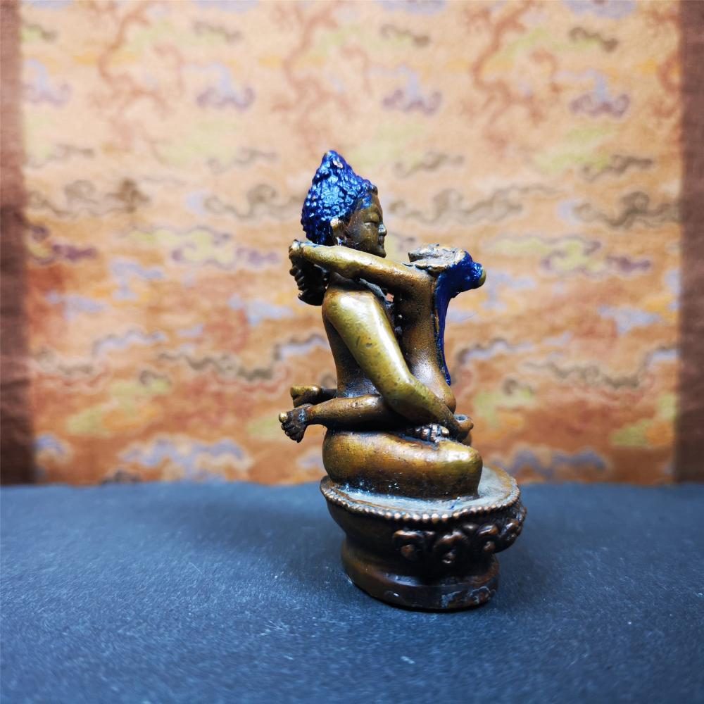 This Samantabhadra Yab Yum statue was handmade in Nepal. It's an old-fashioned statue,made of copper,painted with colors,about 30 years old. In the Nyingma school of Tibetan Buddhism, Samantabhadra is also the name of the Adi-Buddha, often portrayed in indivisible union (yab-yum) with his consort, Samantabhadri.