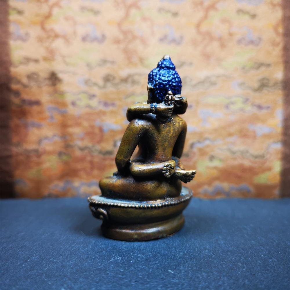 This Samantabhadra Yab Yum statue was handmade in Nepal. It's an old-fashioned statue,made of copper,painted with colors,about 30 years old. In the Nyingma school of Tibetan Buddhism, Samantabhadra is also the name of the Adi-Buddha, often portrayed in indivisible union (yab-yum) with his consort, Samantabhadri.