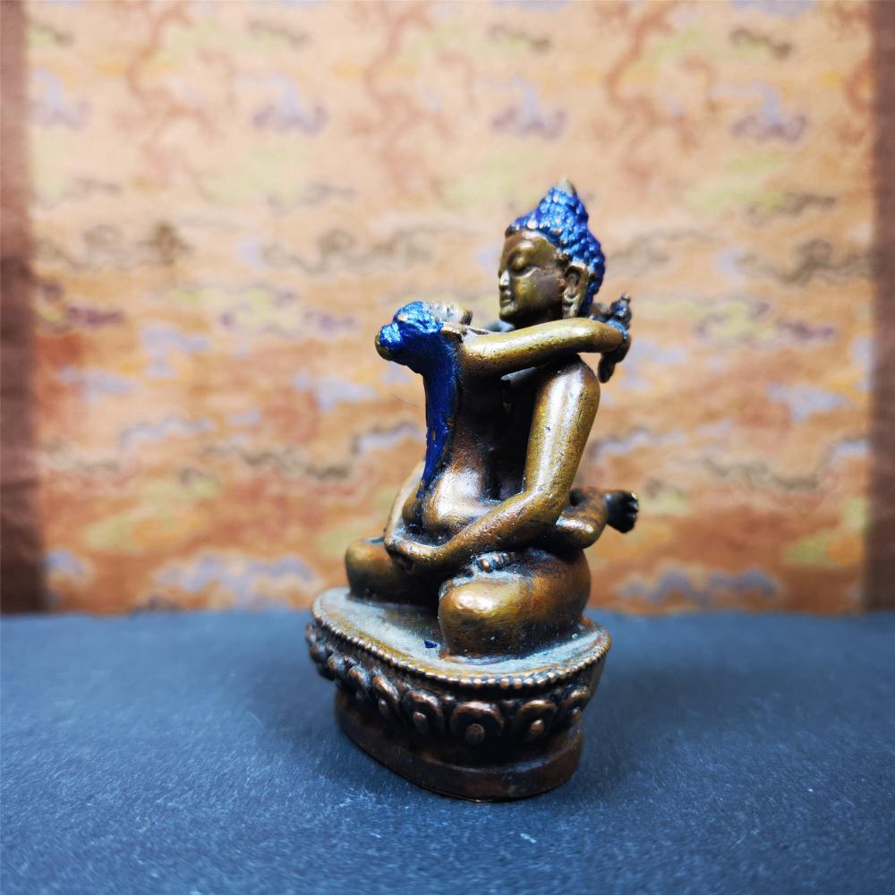 This Samantabhadra Yab Yum statue was handmade in Nepal. It's an old-fashioned statue,made of copper,painted with colors,about 30 years old. In the Nyingma school of Tibetan Buddhism, Samantabhadra is also the name of the Adi-Buddha, often portrayed in indivisible union (yab-yum) with his consort, Samantabhadri.