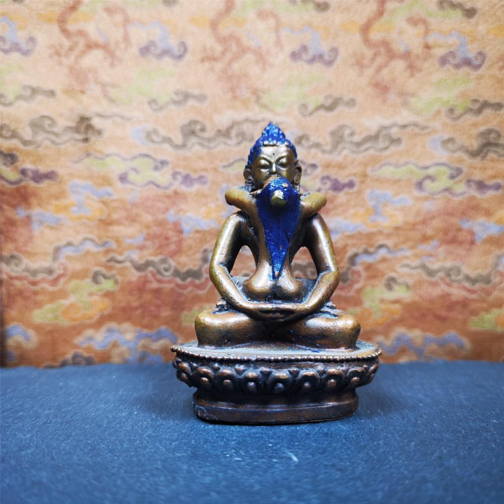 This Samantabhadra Yab Yum statue was handmade in Nepal. It's an old-fashioned statue,made of copper,painted with colors,about 30 years old. In the Nyingma school of Tibetan Buddhism, Samantabhadra is also the name of the Adi-Buddha, often portrayed in indivisible union (yab-yum) with his consort, Samantabhadri.