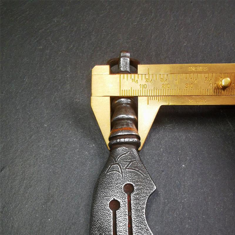 This machete knife is handmade by Tibetan craftsmen from Tibet in 2000s,from Hepo Town, Baiyu County, the birthplace of the famous Tibetan handicrafts. It's made of cold iron,inlaid red copper wire, and the half vajra at the tail