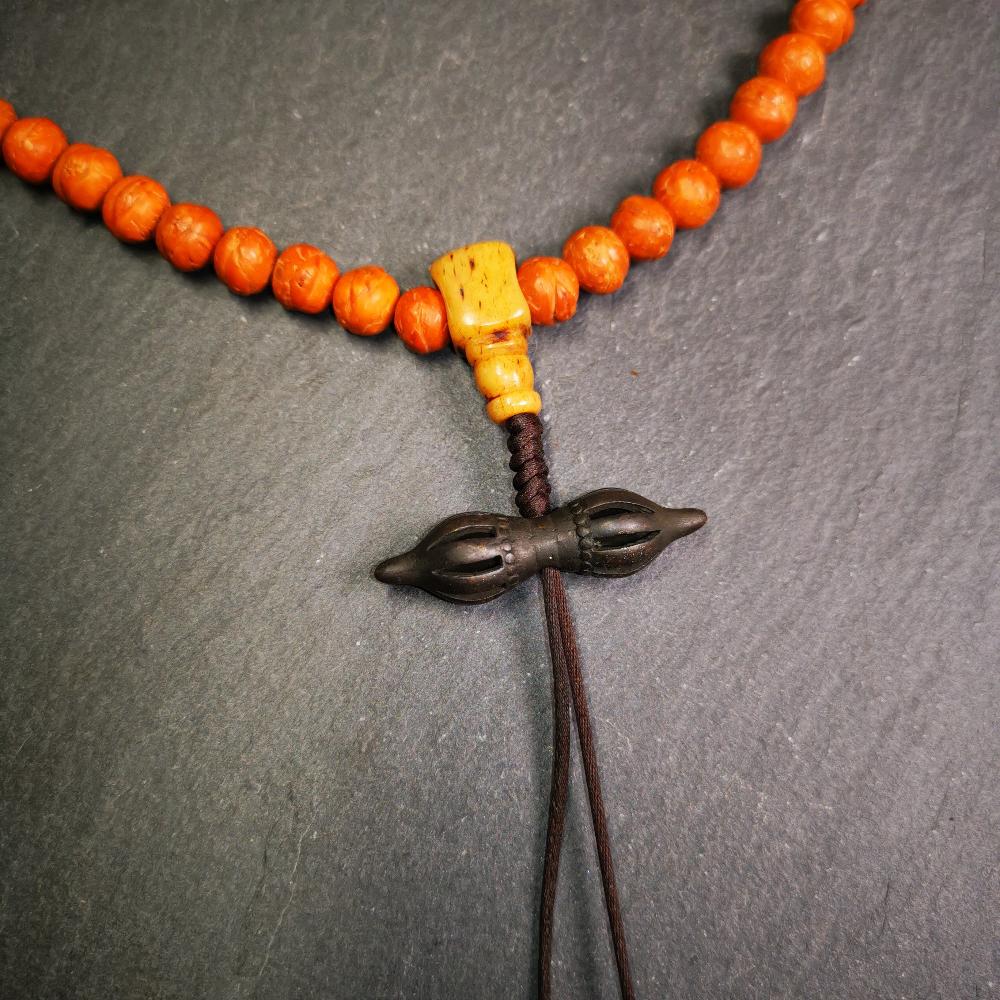 This vajra pendant was handmade by Tibetan craftsmen from Tibet,from Hepo Town, Baiyu County, the birthplace of the famous Tibetan handicrafts. It is nine-pronged vajra,made of brass,black color,1.5 inches length.