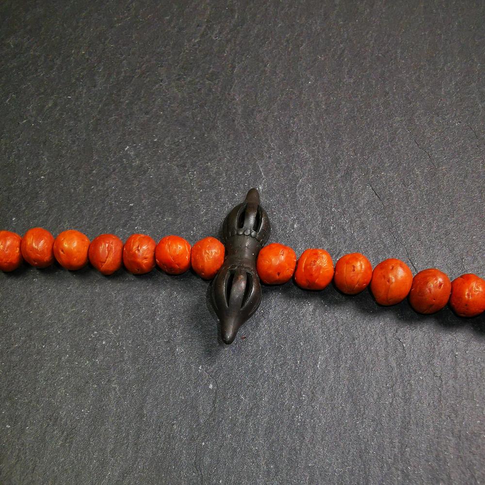 This vajra pendant was handmade by Tibetan craftsmen from Tibet,from Hepo Town, Baiyu County, the birthplace of the famous Tibetan handicrafts. It is nine-pronged vajra,made of brass,black color,1.5 inches length.