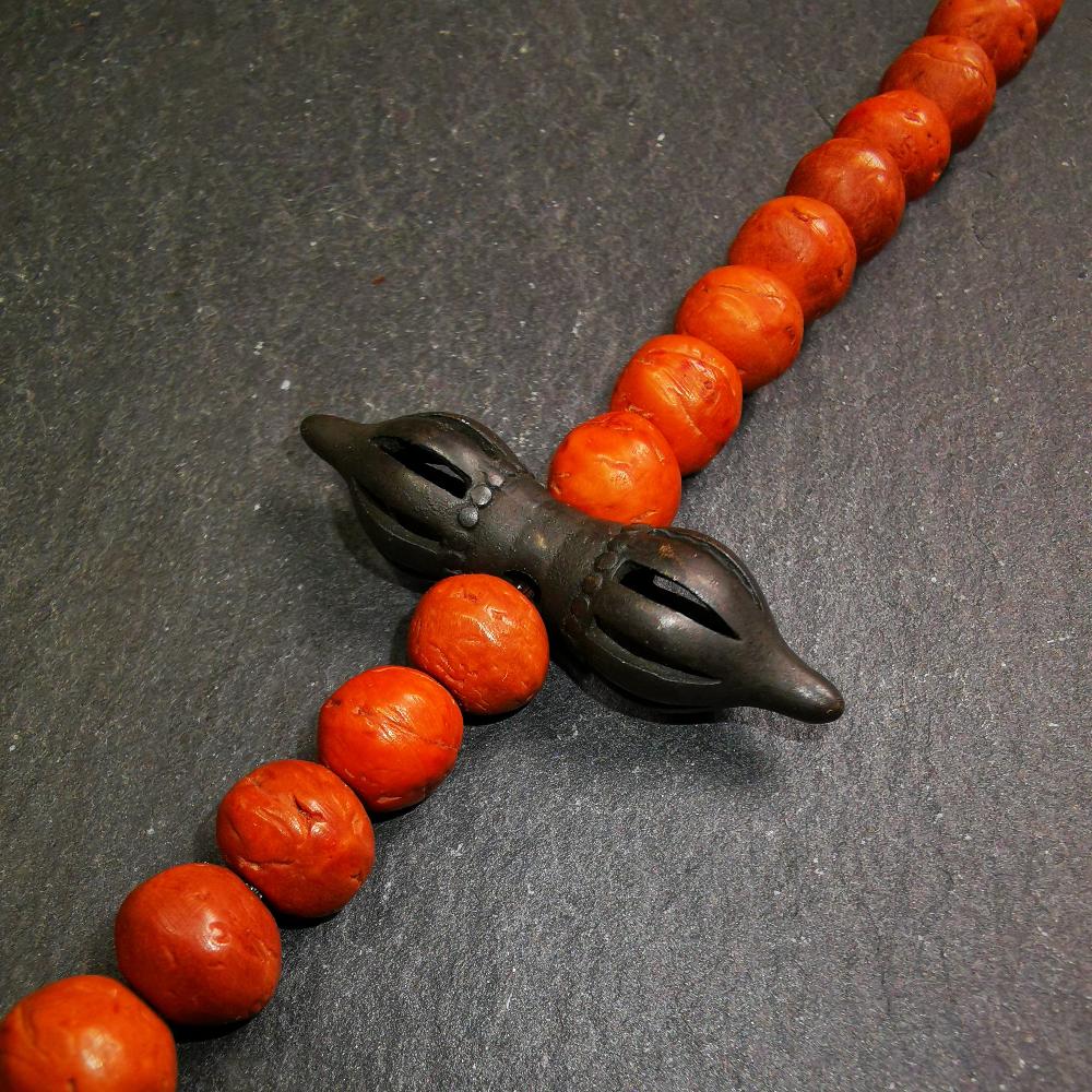 This vajra pendant was handmade by Tibetan craftsmen from Tibet,from Hepo Town, Baiyu County, the birthplace of the famous Tibetan handicrafts. It is nine-pronged vajra,made of brass,black color,1.5 inches length.